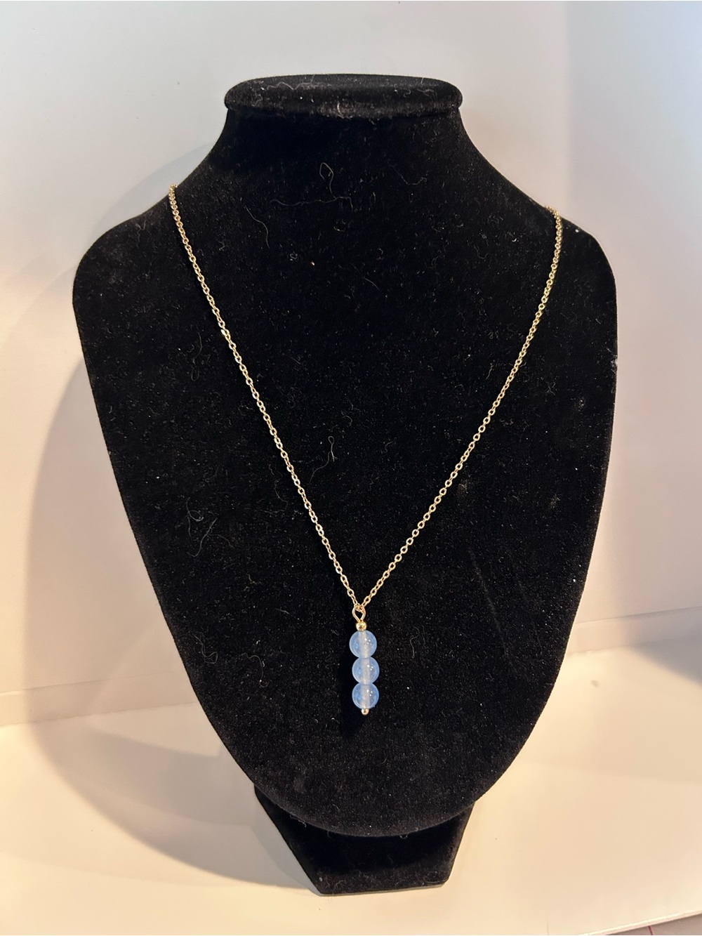 Gold Chain Necklace with Light Blue Bead Trio Pendant